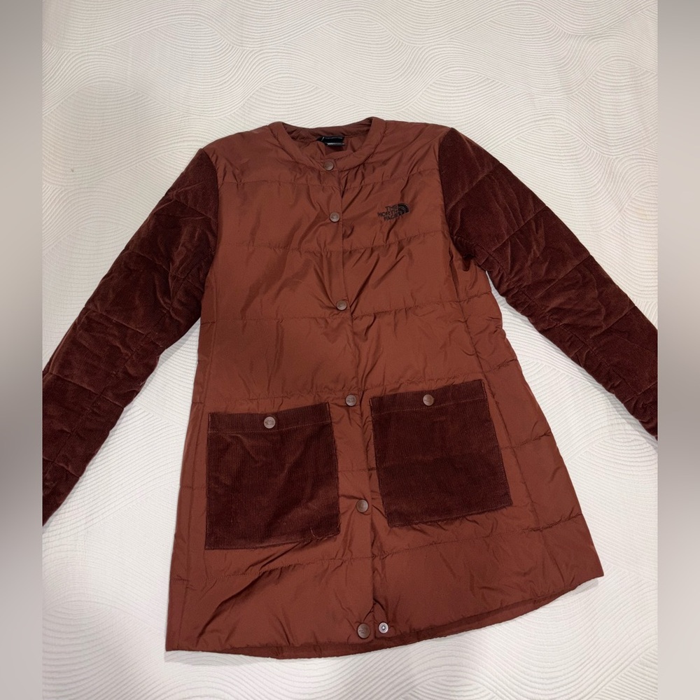 The North Face brown puffer with corduroy sleeves